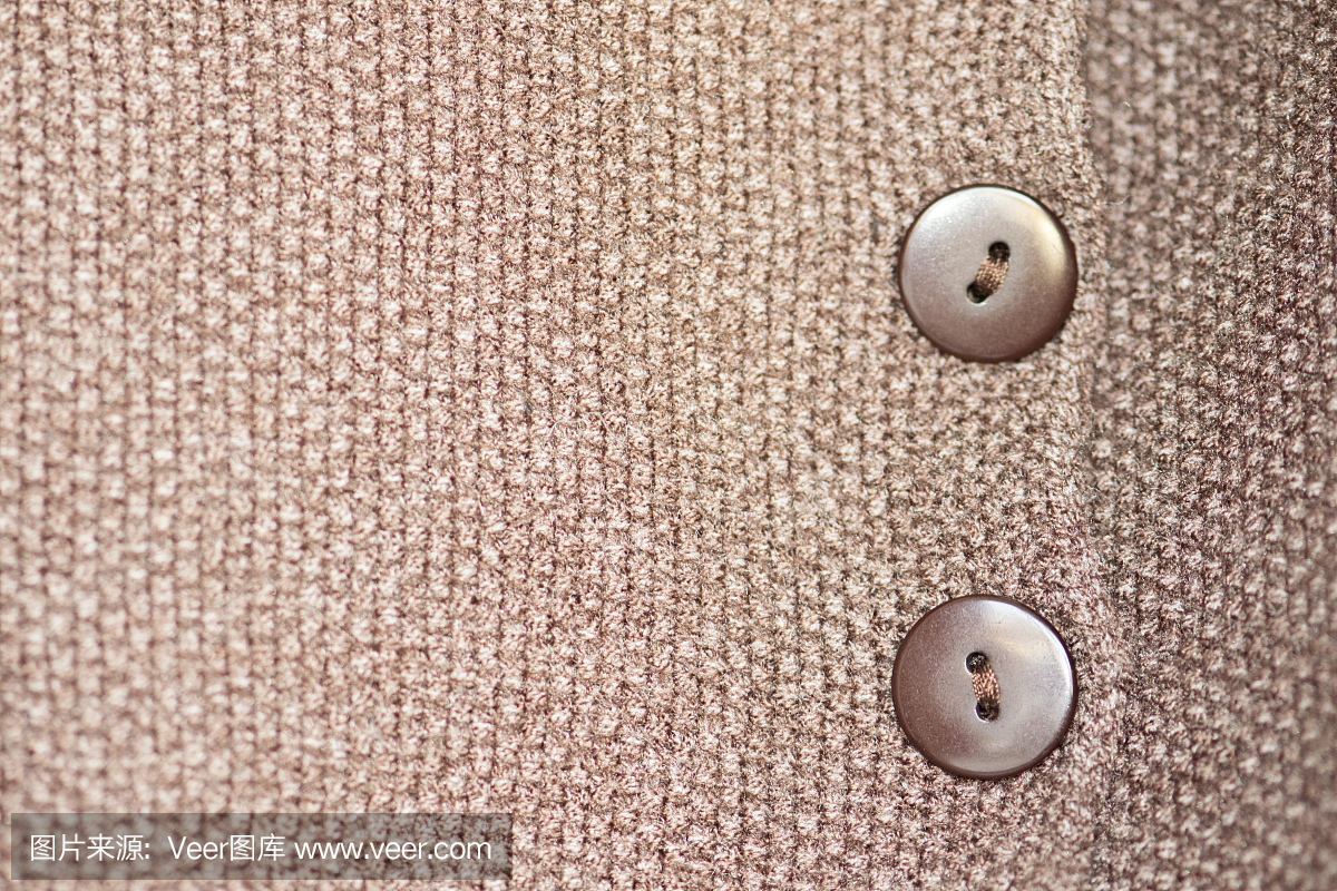 毛线的背景。毛织品质地特写。纺织纹理背景。详细的暖纱背景。